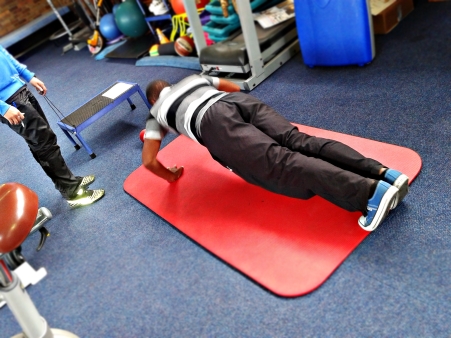 Pictured: Sandile Shabalala doing his (brief fitness test) set of push-ups for 60 seconds